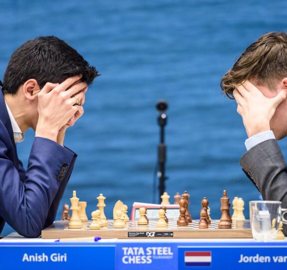 Two players concentrating on the game at the Tata Steel chess tournament round 13-16